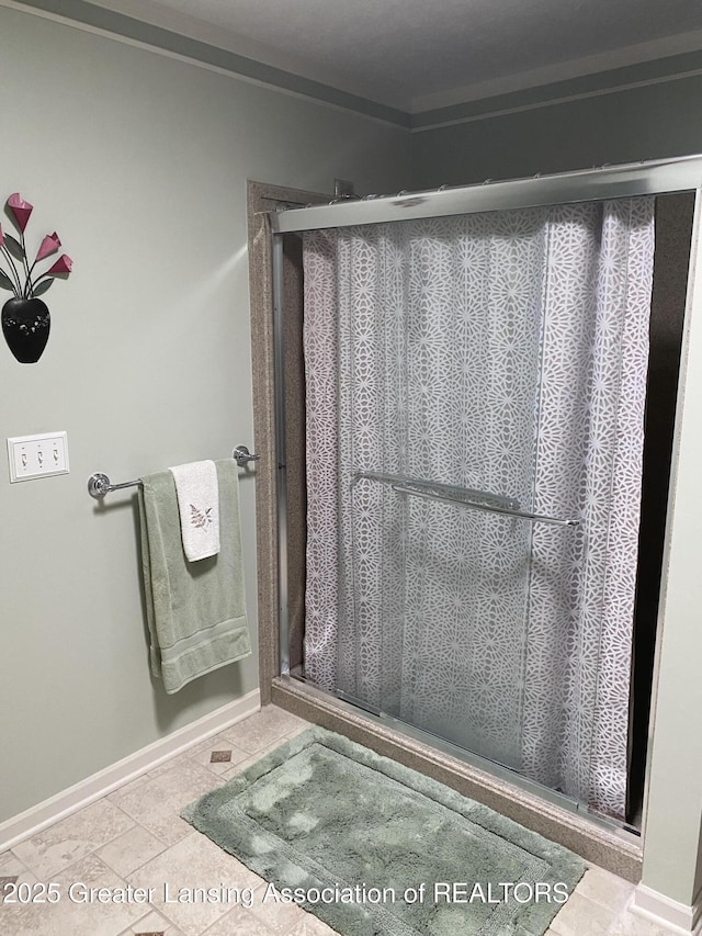 4001 Canyon Cv # 56, Holt, MI 48842 - full bathroom featuring a stall shower and tile patterned floors