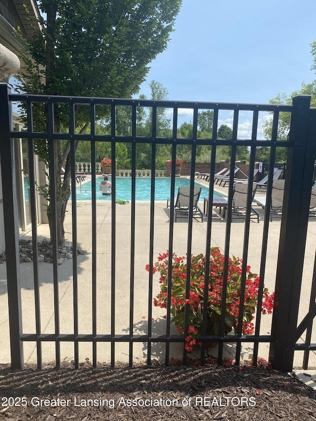 4001 Canyon Cv # 56, Holt, MI 48842 - view of community pool
