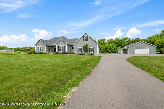 14747 Forest Hill Rd, Grand Ledge, MI 48837 - single story home with a garage and a front lawn