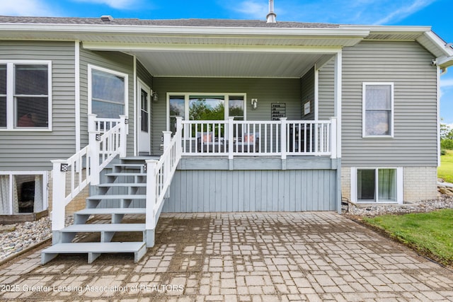 14747 Forest Hill Rd, Grand Ledge, MI 48837 - view of front facade with a porch