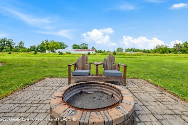 14747 Forest Hill Rd, Grand Ledge, MI 48837 - view of patio / terrace featuring an outdoor fire pit