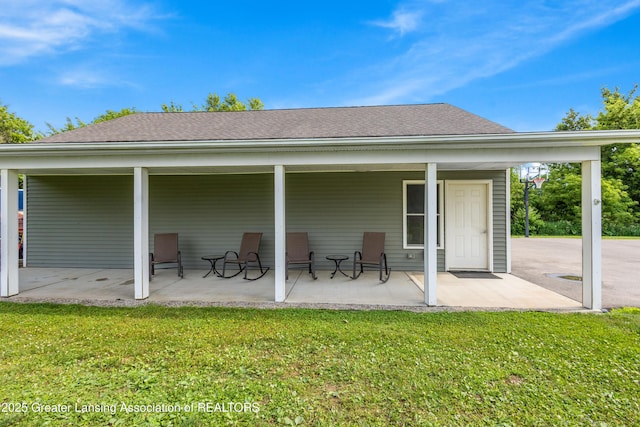 14747 Forest Hill Rd, Grand Ledge, MI 48837 - rear view of house featuring a yard and a patio