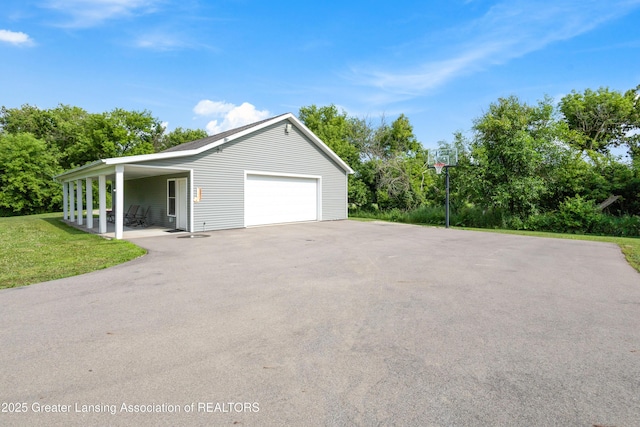 14747 Forest Hill Rd, Grand Ledge, MI 48837 - garage with asphalt driveway