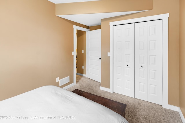 14747 Forest Hill Rd, Grand Ledge, MI 48837 - bedroom with carpet flooring and a closet