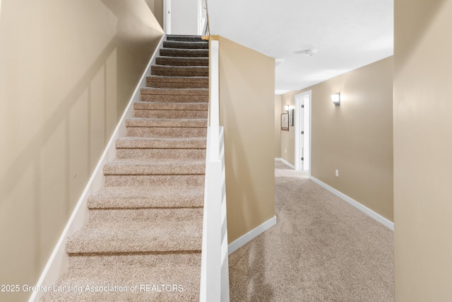 14747 Forest Hill Rd, Grand Ledge, MI 48837 - staircase featuring carpet and baseboards