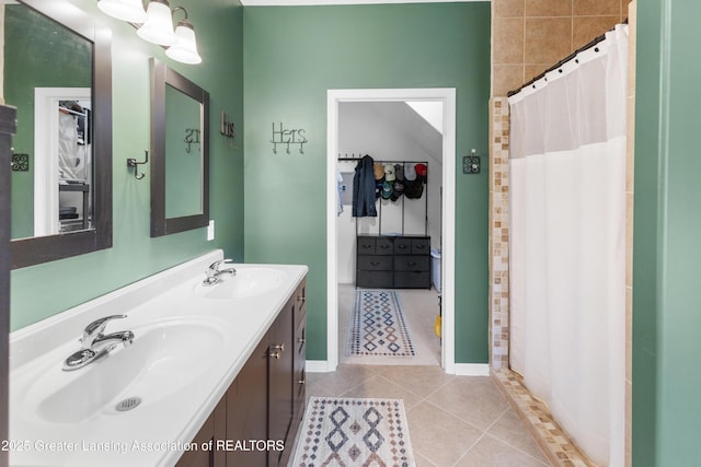 14747 Forest Hill Rd, Grand Ledge, MI 48837 - bathroom with tile patterned flooring, double vanity, and a tile shower