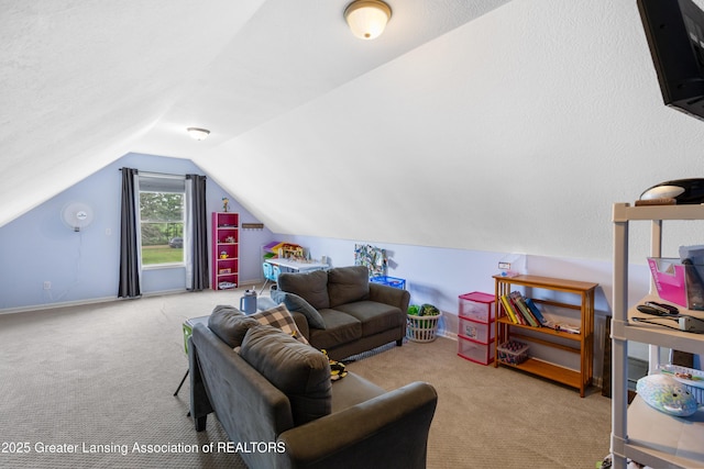 14747 Forest Hill Rd, Grand Ledge, MI 48837 - living area featuring carpet floors and vaulted ceiling