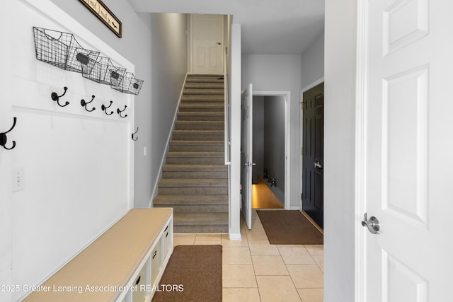 14747 Forest Hill Rd, Grand Ledge, MI 48837 - mudroom with light tile patterned floors and baseboards