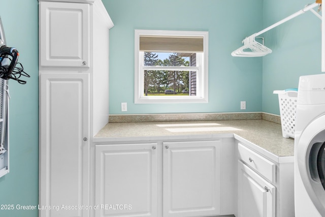 14747 Forest Hill Rd, Grand Ledge, MI 48837 - laundry room with washer / dryer and cabinet space