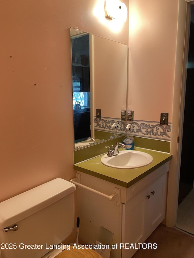 3931 Berry Ridge Dr, Holt, MI 48842 - bathroom with toilet and vanity
