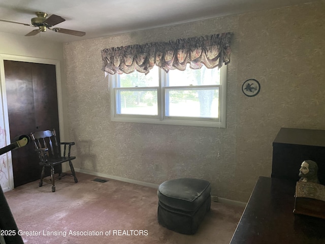 3931 Berry Ridge Dr, Holt, MI 48842 - dining room featuring carpet floors and a ceiling fan