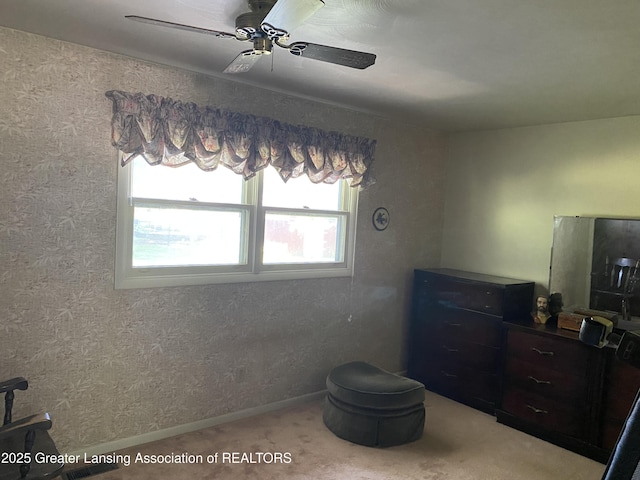 3931 Berry Ridge Dr, Holt, MI 48842 - carpeted bedroom featuring a ceiling fan and baseboards