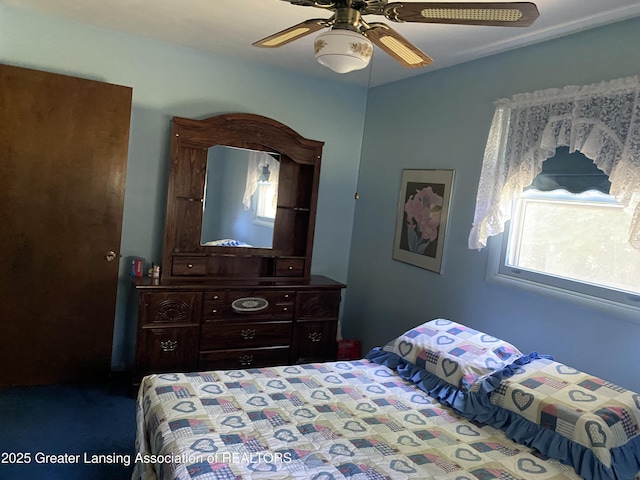 3931 Berry Ridge Dr, Holt, MI 48842 - bedroom with ceiling fan and carpet floors