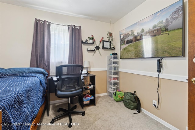 8713 Wintergreen St, Lansing, MI 48917 - carpeted bedroom featuring an office area and baseboards