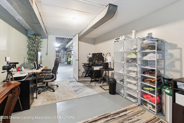 8713 Wintergreen St, Lansing, MI 48917 - office space featuring concrete flooring