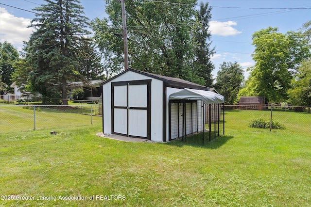 8713 Wintergreen St, Lansing, MI 48917 - view of shed featuring a fenced backyard