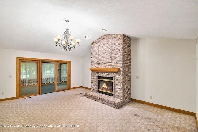 6875 W Howe Rd, Dewitt, MI 48820 - unfurnished living room with carpet floors, a chandelier, lofted ceiling, and a fireplace