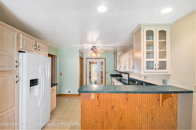 6875 W Howe Rd, Dewitt, MI 48820 - kitchen with white appliances, a peninsula, glass insert cabinets, ceiling fan, and recessed lighting