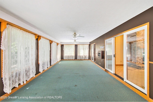 6875 W Howe Rd, Dewitt, MI 48820 - unfurnished sunroom featuring heating unit