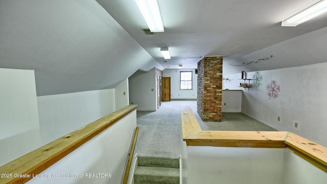 502 S Main St, Eaton Rapids, MI 48827 - stairs with vaulted ceiling and carpet floors