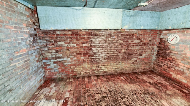 502 S Main St, Eaton Rapids, MI 48827 - basement featuring brick wall