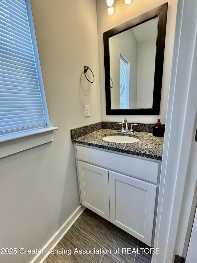 4314 Ringneck Ln, Holt, MI 48842 - bathroom featuring vanity and baseboards