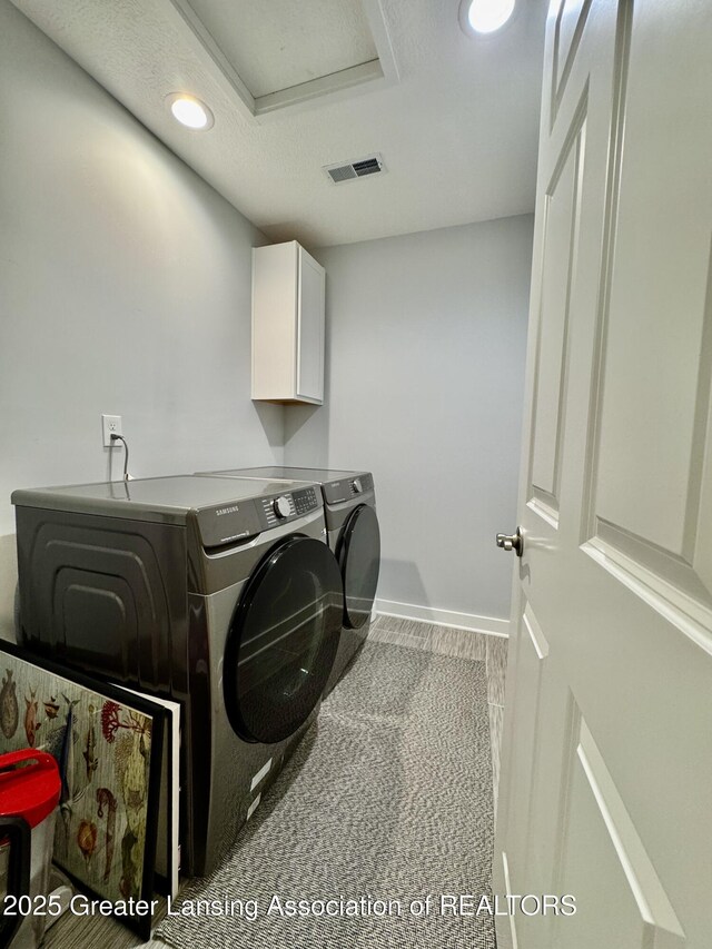 4314 Ringneck Ln, Holt, MI 48842 - laundry area with washing machine and clothes dryer, cabinet space, recessed lighting, and attic access