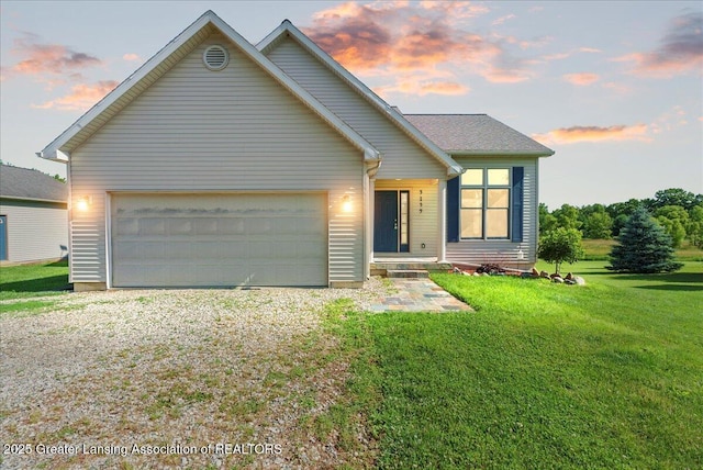 5159 E Pratt Rd, Saint Johns, MI 48879 - view of front of property featuring a front yard, an attached garage, and driveway