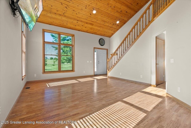 5159 E Pratt Rd, Saint Johns, MI 48879 - entrance foyer with stairs, wood finished floors, and wood ceiling