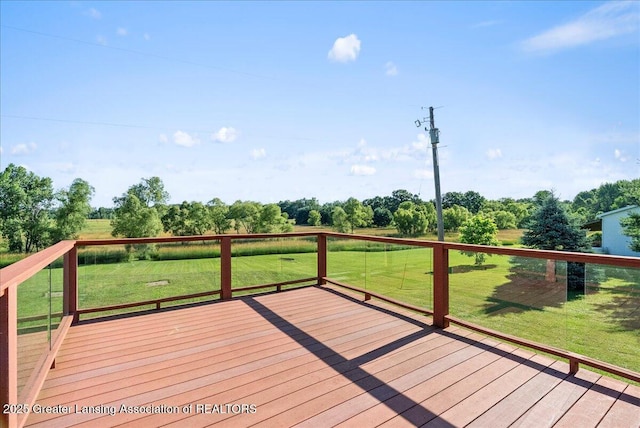 5159 E Pratt Rd, Saint Johns, MI 48879 - wooden terrace featuring a yard, a view of rural / pastoral area, and view of wooded area