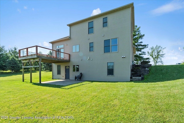 5159 E Pratt Rd, Saint Johns, MI 48879 - back of house with a lawn, a patio area, and a wooden deck