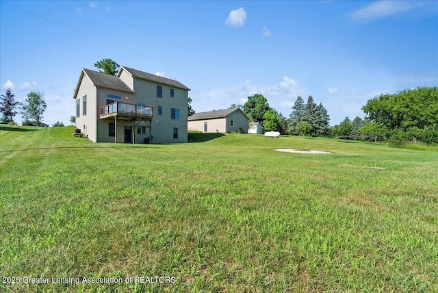 5159 E Pratt Rd, Saint Johns, MI 48879 - view of green lawn with a wooden deck