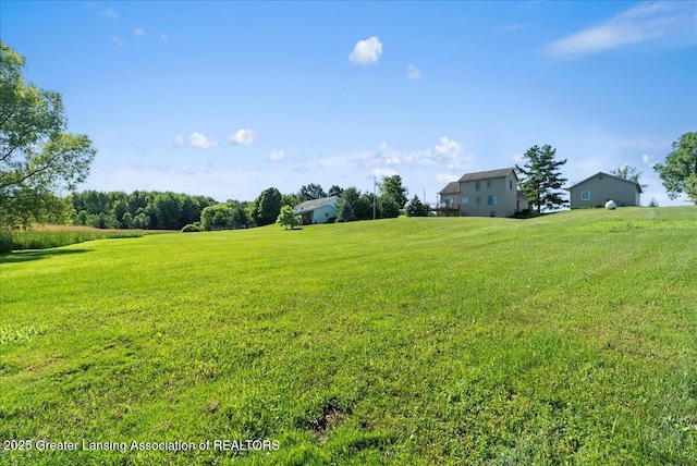 5159 E Pratt Rd, Saint Johns, MI 48879 - view of grassy yard featuring a view of countryside