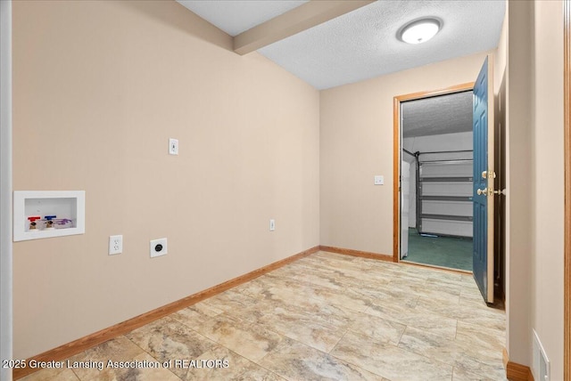 5159 E Pratt Rd, Saint Johns, MI 48879 - laundry area featuring washer hookup, a textured ceiling, and hookup for an electric dryer