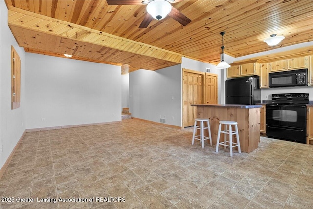 5159 E Pratt Rd, Saint Johns, MI 48879 - kitchen featuring black appliances, wooden ceiling, a ceiling fan, light brown cabinetry, and a kitchen breakfast bar