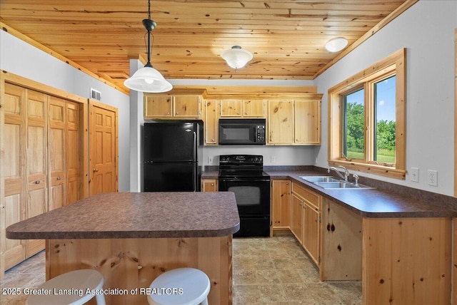 5159 E Pratt Rd, Saint Johns, MI 48879 - kitchen featuring black appliances, dark countertops, wood ceiling, light brown cabinetry, and a kitchen island