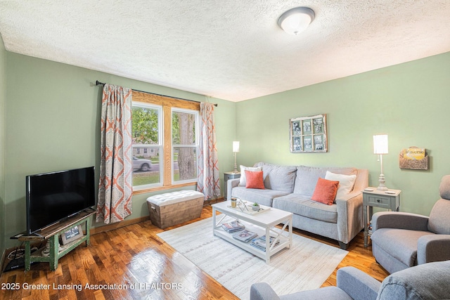112 Ferry St, Corunna, MI 48817 - living room with a textured ceiling and wood finished floors