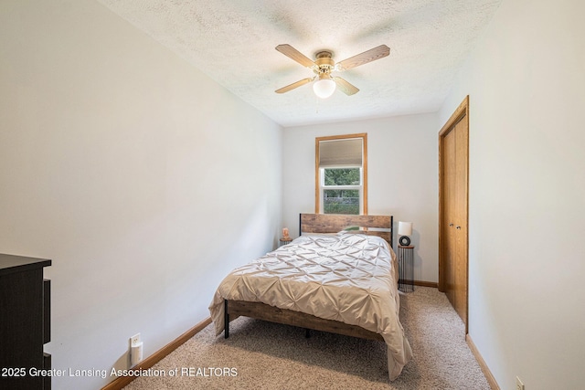 112 Ferry St, Corunna, MI 48817 - bedroom featuring a textured ceiling, light carpet, and ceiling fan