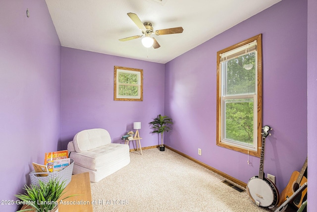 112 Ferry St, Corunna, MI 48817 - sitting room featuring plenty of natural light, carpet floors, and a ceiling fan