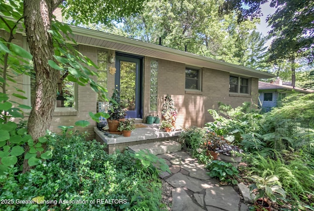4451 Greenwood Dr, Okemos, MI 48864 - back of property with brick siding
