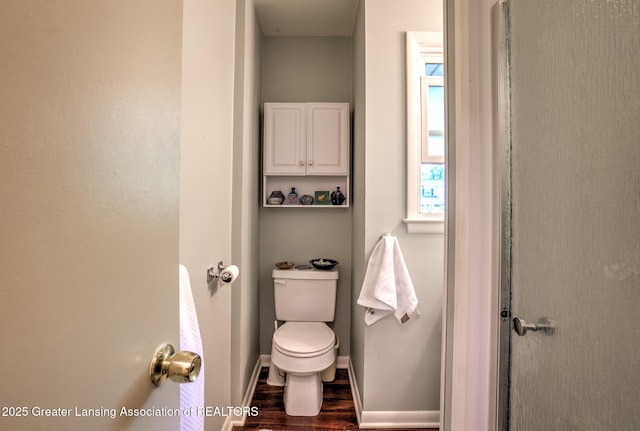 4451 Greenwood Dr, Okemos, MI 48864 - bathroom with wood finished floors and toilet