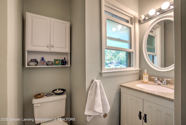4451 Greenwood Dr, Okemos, MI 48864 - bathroom featuring toilet and vanity