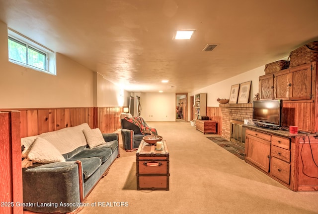 4451 Greenwood Dr, Okemos, MI 48864 - living room with a wainscoted wall, carpet, wood walls, and a fireplace