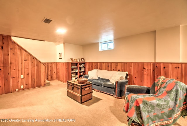 4451 Greenwood Dr, Okemos, MI 48864 - living room featuring wooden walls, carpet floors, and a wainscoted wall