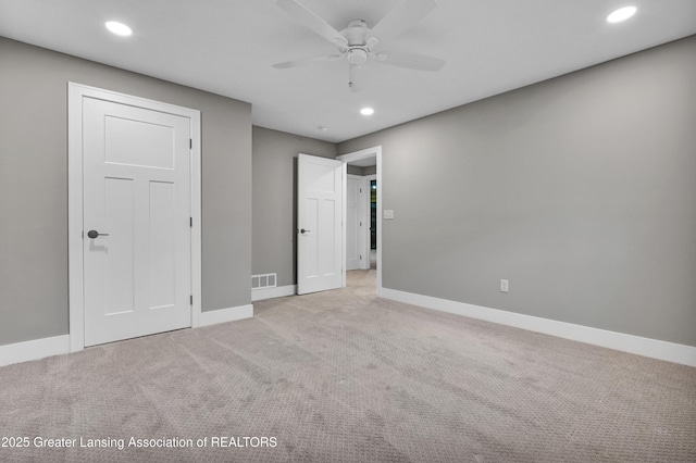 330 Vansickle Dr Unit 31, Charlotte, MI 48813 - unfurnished bedroom featuring carpet floors, recessed lighting, and ceiling fan