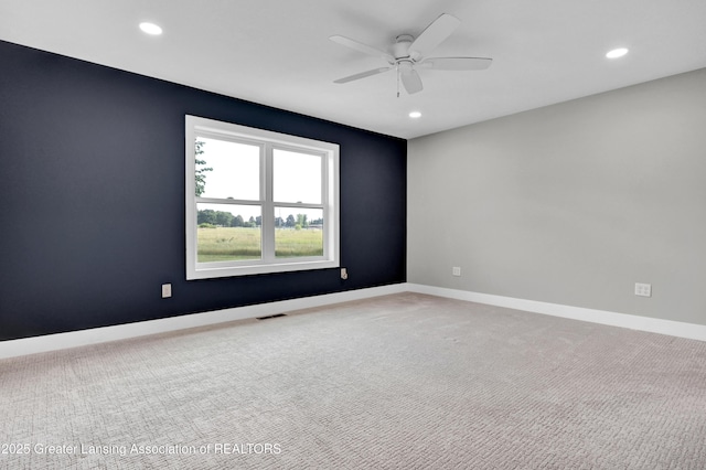 330 Vansickle Dr Unit 31, Charlotte, MI 48813 - spare room with recessed lighting, a ceiling fan, and carpet floors