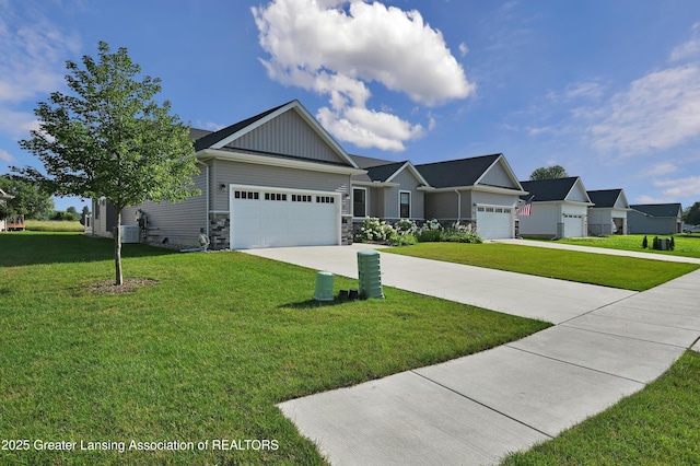 330 Vansickle Dr Unit 31, Charlotte, MI 48813 - view of front facade featuring board and batten siding, a garage, a front lawn, and concrete driveway