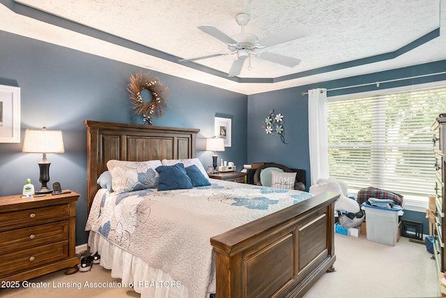 26 Aviemore Dr, Mason, MI 48854 - bedroom with light carpet, a textured ceiling, and ceiling fan