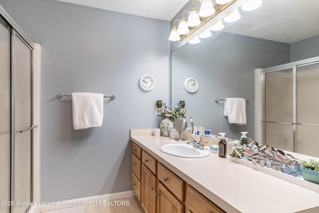 26 Aviemore Dr, Mason, MI 48854 - bathroom with vanity, a stall shower, and tile patterned flooring