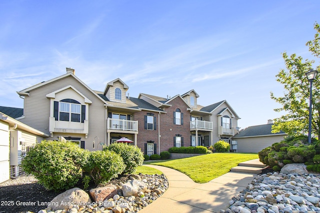 3706 Flying Gulch Dr, Holt, MI 48842 - view of front of property featuring a front yard